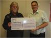 BARRY PRESENTING CHEQUE FOR £4,750. TO MR COLIN LANG,CHIEF EXECUTIVE OFFICER OF "NELSON'S JOURNEY" 2013 CHILDREN'S CHARITY