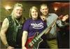 BILLY BATCHELOR WINNER OF THE BRIAN MAY SIGNED RED SPECIAL WITH AUCTIONEER CHARLES HORNER-GLISTER AND A CHARITY REPRESENTATIVE FROM "NELSON'S JOURNEY"