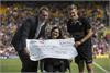 2014 Charity cheque for £10,000 being presented to the representatives of the Sporting Light Appeal by Connor Kerry ,Grandson of the organiser Barry Holden, at Jamie's game Carrow road.
PHOTO by Andrew Roland
Photography by Andrew Roland