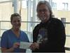 Cheque presentation to member of the I.C.U.neonatal dept