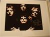 Framed Queen photo signed by Roger Taylor